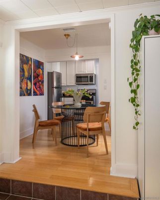 Dining room, Interior, Kitchen, Pendant Lights, Stainless Steel Appliances, Wood Texture Flooring
