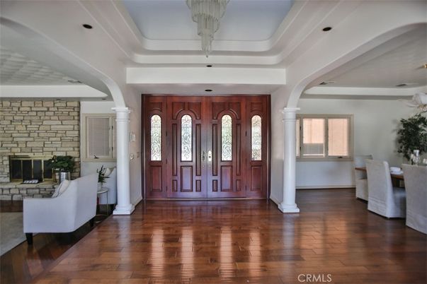Dining room, Fireplace, Interior, Recessed Lighting, Stone Walls, Wood Texture Flooring