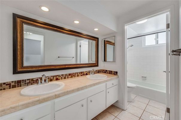 Bathroom, Dual Sink Vanities, Interior, Recessed Lighting, Tile Countertops