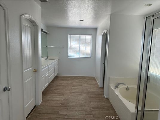 Bathroom, Dual Sink Vanities, Interior, Recessed Lighting, Wood Texture Flooring