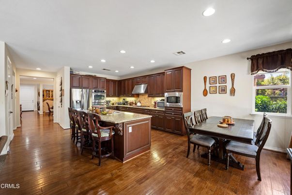 Dining room, Interior, Kitchen, Recessed Lighting, Stainless Steel Appliances, Wood Texture Flooring