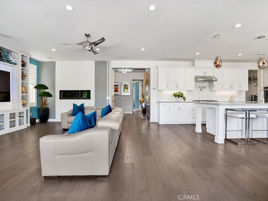 Fireplace, Interior, Kitchen, Living room, Pendant Lights, Recessed Lighting, Stainless Steel Appliances, Wood Texture Flooring