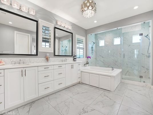 Bathroom, Dual Sink Vanities, Glass Shower, Interior, Marble, Marble Walls, Recessed Lighting