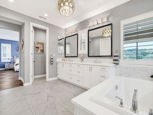 Bathroom, Chandelier, Dual Sink Vanities, Interior, Marble, Recessed Lighting, Wood Texture Flooring