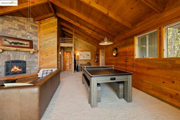 Billiard Table, Fireplace, Game Room, Interior, Pendant Lights, Stone Walls, Wooden Beams, Wooden Ceilings, Wooden Walls