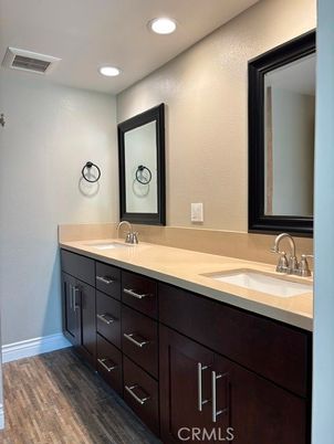 Bathroom, Dual Sink Vanities, Interior, Recessed Lighting, Wood Texture Flooring
