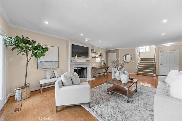 Fireplace, Interior, Living room, Recessed Lighting, Wood Texture Flooring