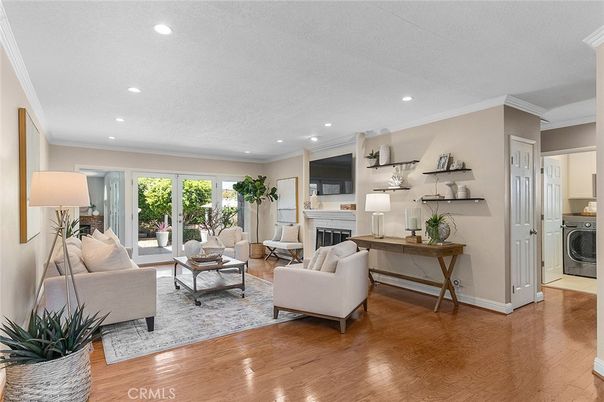Fireplace, Interior, Living room, Recessed Lighting, Washer, Wood Texture Flooring