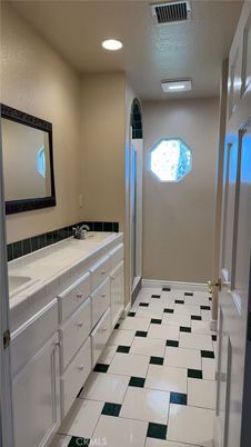 Bathroom, Dual Sink Vanities, Interior, Recessed Lighting, Tile Countertops