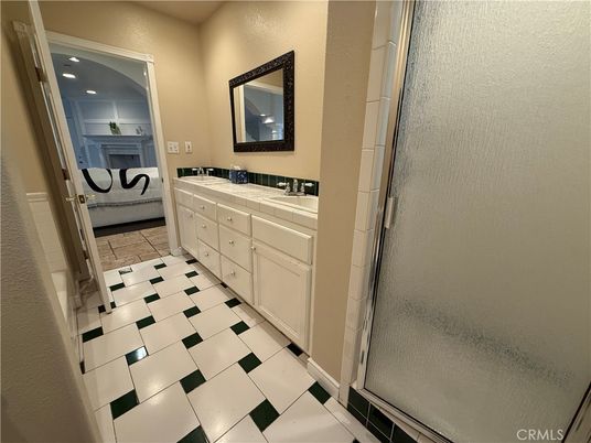 Bathroom, Dual Sink Vanities, Interior, Recessed Lighting, Tile Countertops