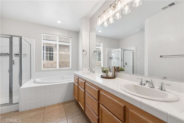 Bathroom, Dual Sink Vanities, Glass Shower, Interior, Recessed Lighting, Tile Countertops
