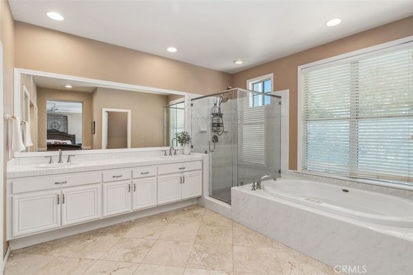 Bathroom, Dual Sink Vanities, Glass Shower, Interior, Recessed Lighting, Tile Countertops