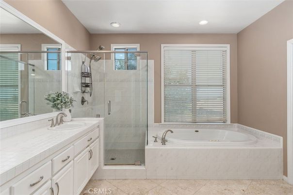Bathroom, Dual Sink Vanities, Glass Shower, Interior, Recessed Lighting, Tile Countertops
