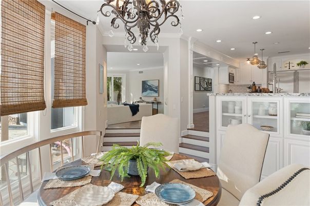 Dining room, Interior, Kitchen, Living room, Pendant Lights, Recessed Lighting, Stainless Steel Appliances, Wood Texture Flooring