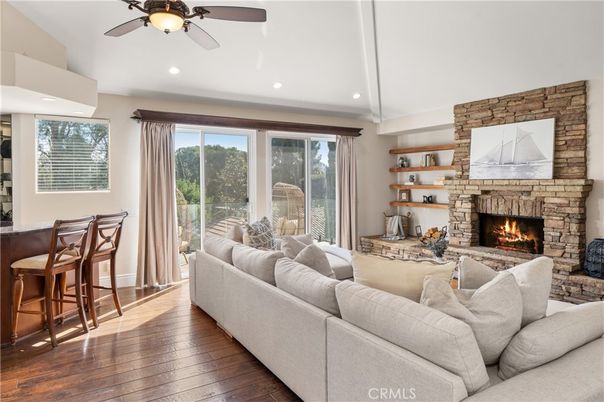 Fireplace, Interior, Living room, Recessed Lighting, Stone Walls, Wood Texture Flooring