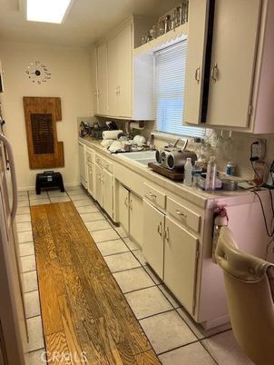Interior, Kitchen, Tile Countertops, Wood Texture Flooring