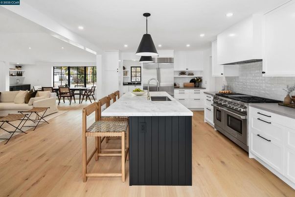 Dining room, Interior, Kitchen, Living room, Pendant Lights, Recessed Lighting, Stainless Steel Appliances, Wood Texture Flooring