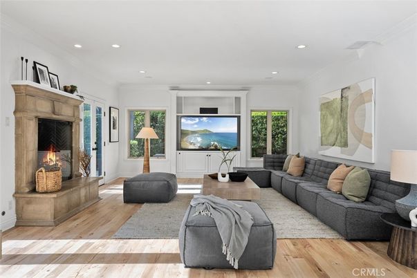Fireplace, Interior, Living room, Recessed Lighting, Water, Wood Texture Flooring
