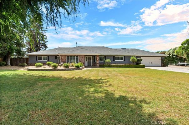 Attached, Backyard, Exterior, Facade, Brick Facade, Ranch