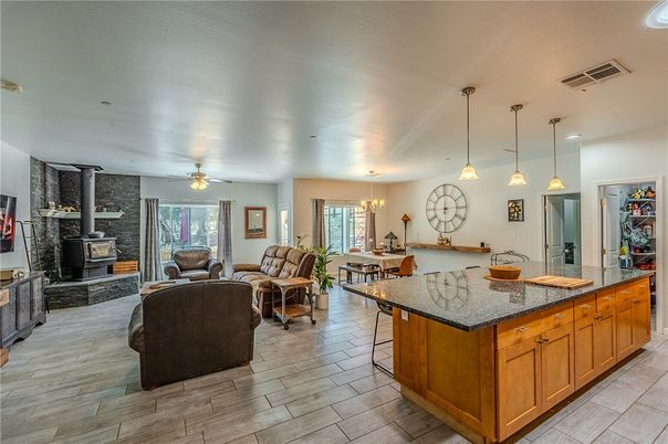 Chandelier, Dining room, Fireplace, Interior, Living room, Pendant Lights, Wood Texture Flooring