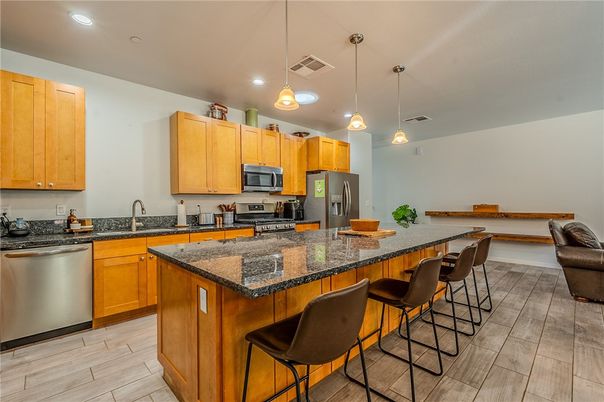 Interior, Kitchen, Pendant Lights, Recessed Lighting, Stainless Steel Appliances, Wood Texture Flooring