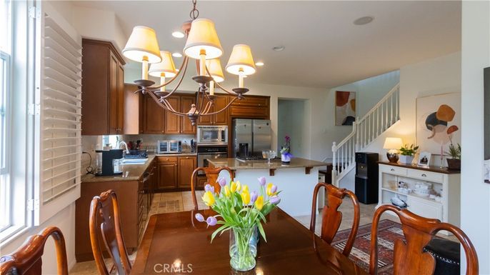 Chandelier, Dining room, Interior, Kitchen, Recessed Lighting, Stainless Steel Appliances, Wood Texture Flooring
