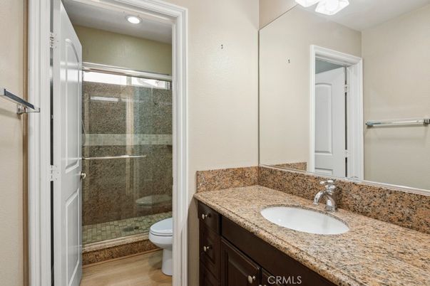 Bathroom, Glass Shower, Interior, Recessed Lighting, Wood Texture Flooring