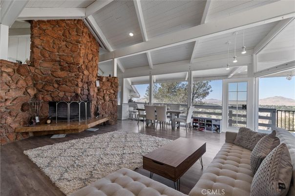 Dining room, Fireplace, Interior, Living room, Pendant Lights, Recessed Lighting, Stone Walls, Wood Texture Flooring