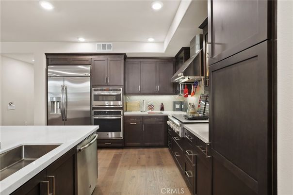 Interior, Kitchen, Recessed Lighting, Stainless Steel Appliances, Wood Texture Flooring