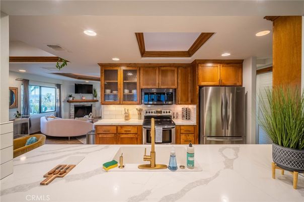 Fireplace, Interior, Kitchen, Living room, Recessed Lighting, Stainless Steel Appliances
