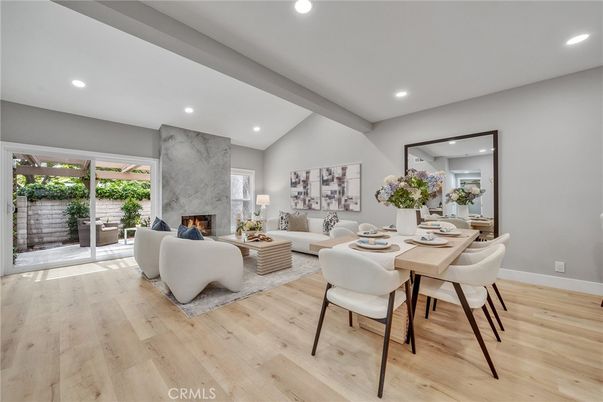 Dining room, Fireplace, Interior, Living room, Recessed Lighting, Wood Texture Flooring