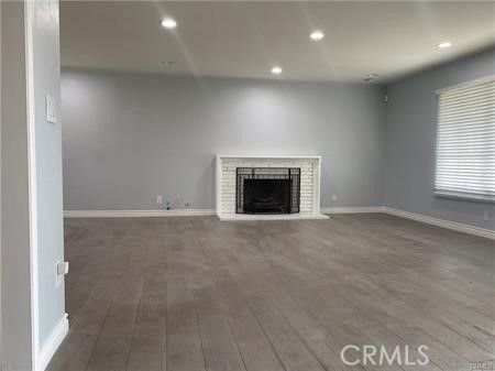Empty room, Fireplace, Interior, Recessed Lighting, Wood Texture Flooring
