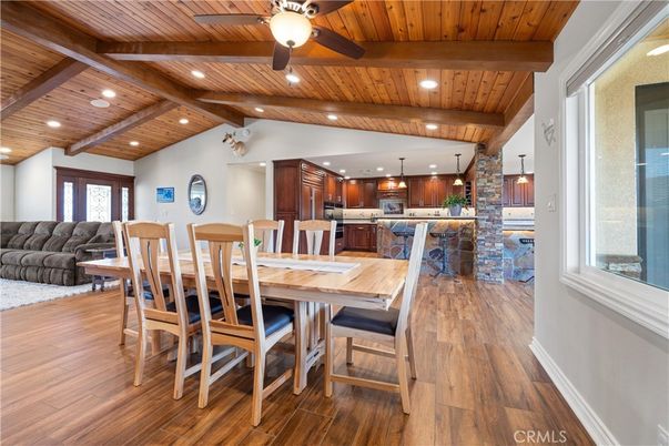 Dining room, Interior, Kitchen, Living room, Pendant Lights, Recessed Lighting, Stainless Steel Appliances, Wooden Beams, Wooden Ceilings, Wood Texture Flooring