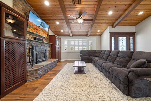 Fireplace, Interior, Living room, Recessed Lighting, Stone Walls, Wooden Beams, Wooden Ceilings, Wood Texture Flooring