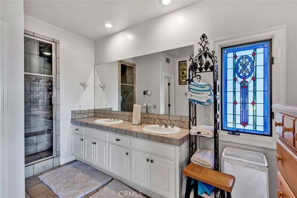 Bathroom, Dual Sink Vanities, Glass Shower, Interior, Recessed Lighting, Tile Countertops