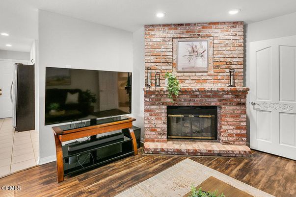 Fireplace, Interior, Recessed Lighting, Stone Walls, Wood Texture Flooring