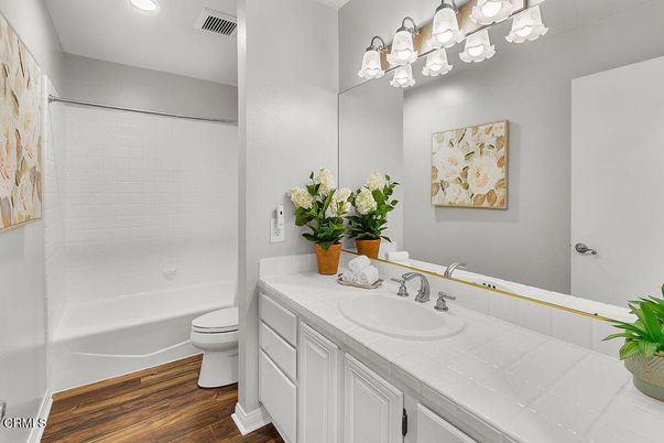 Bathroom, Interior, Recessed Lighting, Tile Countertops, Wood Texture Flooring