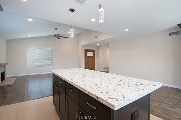 Fireplace, Interior, Pendant Lights, Recessed Lighting, Wood Texture Flooring