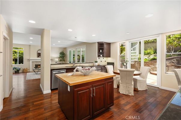 Dining room, Fireplace, Interior, Kitchen, Recessed Lighting, Wood Texture Flooring