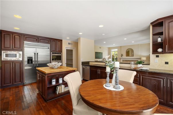Dining room, Interior, Kitchen, Recessed Lighting, Stainless Steel Appliances, Wood Texture Flooring