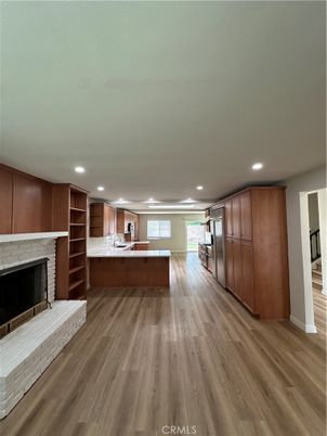 Fireplace, Interior, Kitchen, Recessed Lighting, Wood Texture Flooring