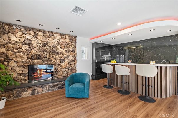 Fireplace, Interior, Recessed Lighting, Stone Walls, Wood Texture Flooring