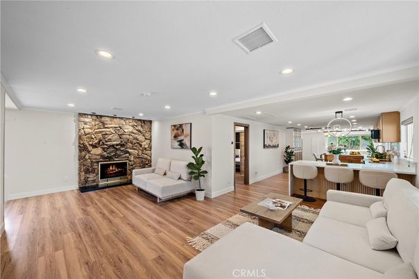 Dining room, Fireplace, Interior, Living room, Pendant Lights, Recessed Lighting, Stone Walls, Wood Texture Flooring