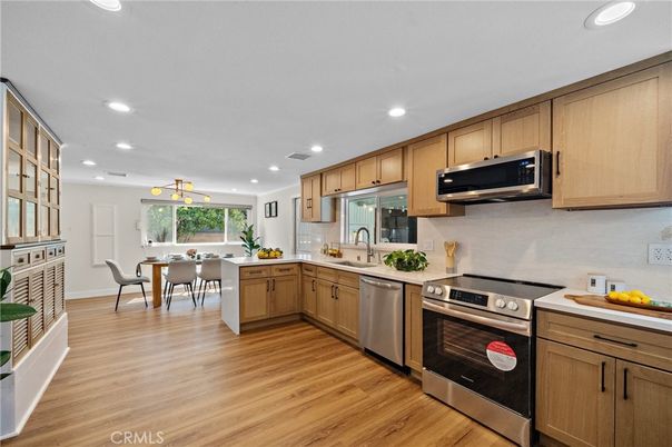 Dining room, Interior, Kitchen, Recessed Lighting, Stainless Steel Appliances, Wood Texture Flooring