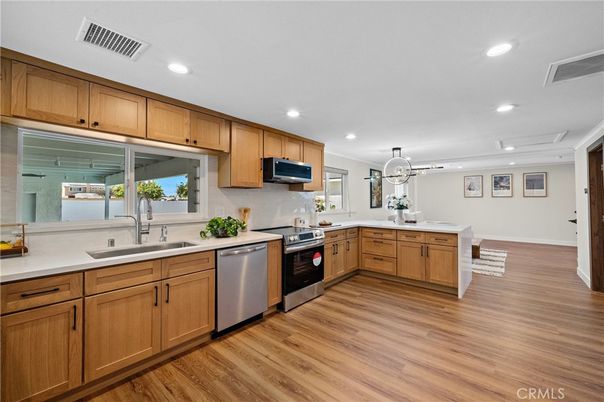 Interior, Kitchen, Pendant Lights, Recessed Lighting, Stainless Steel Appliances, Wood Texture Flooring