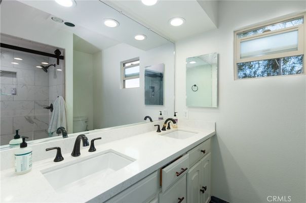Bathroom, Dual Sink Vanities, Interior, Marble Walls, Recessed Lighting