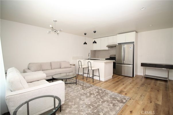 Interior, Kitchen, Living room, Pendant Lights, Recessed Lighting, Stainless Steel Appliances, Wood Texture Flooring