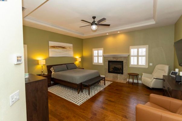 Bedroom, Fireplace, Interior, Recessed Lighting, Wood Texture Flooring