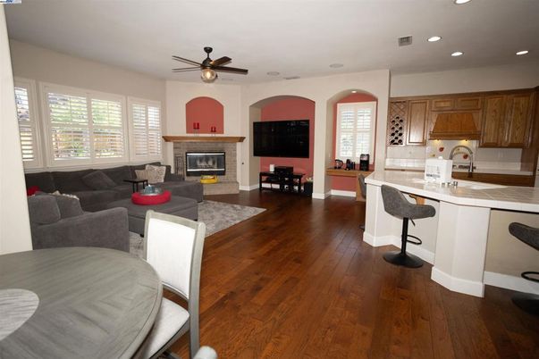 Dining room, Fireplace, Interior, Kitchen, Living room, Recessed Lighting, Wood Texture Flooring
