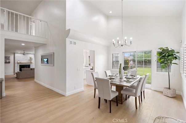Chandelier, Dining room, Fireplace, Interior, Pendant Lights, Recessed Lighting, Wood Texture Flooring